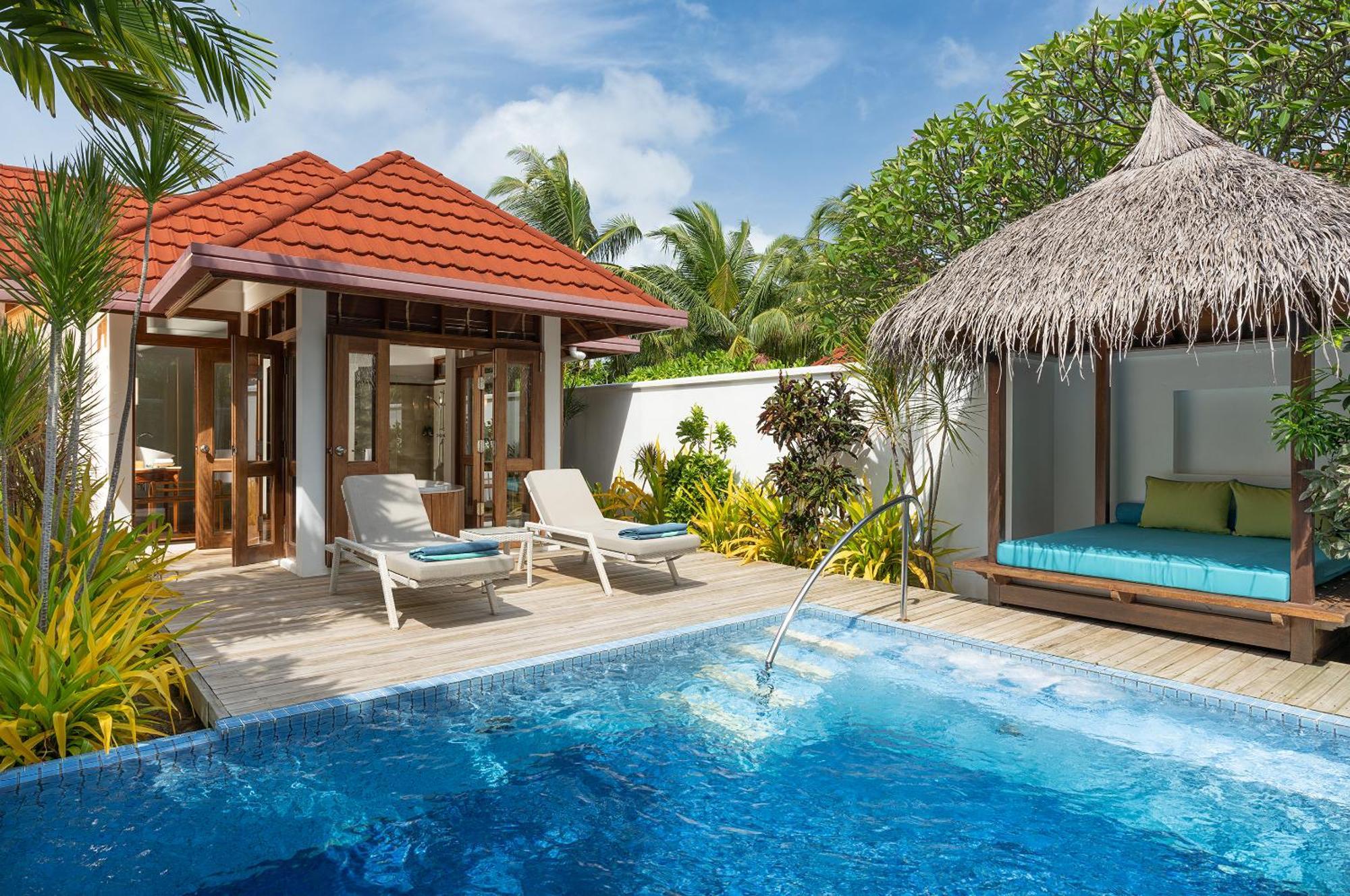 Kurumba Maldives Vihamanaafushi Exterior foto A pool villa at the resort
