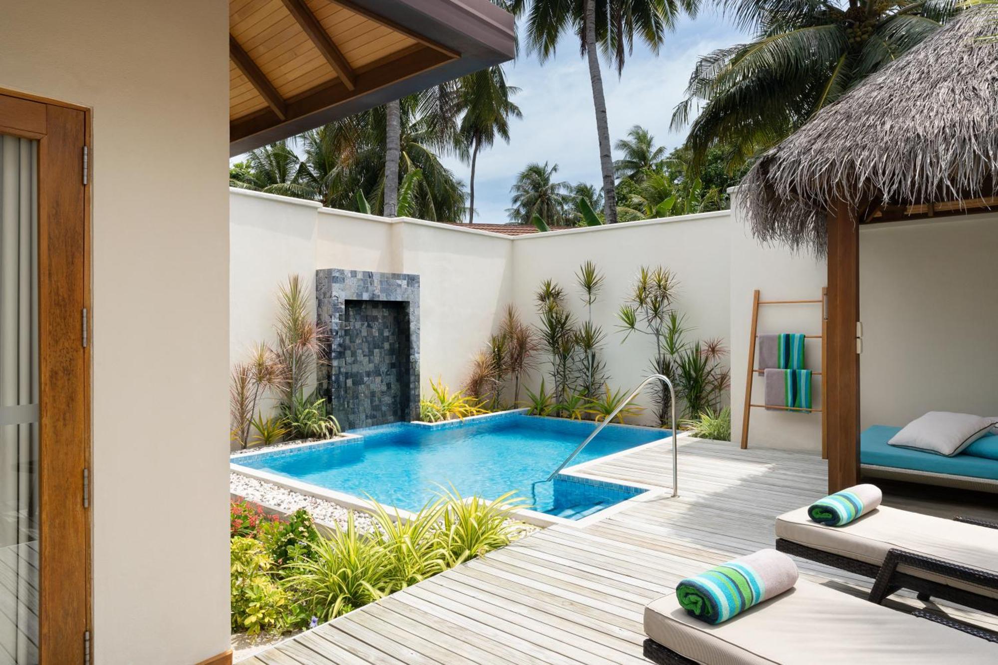 Kurumba Maldives Vihamanaafushi Exterior foto A private pool at a resort in Maldives