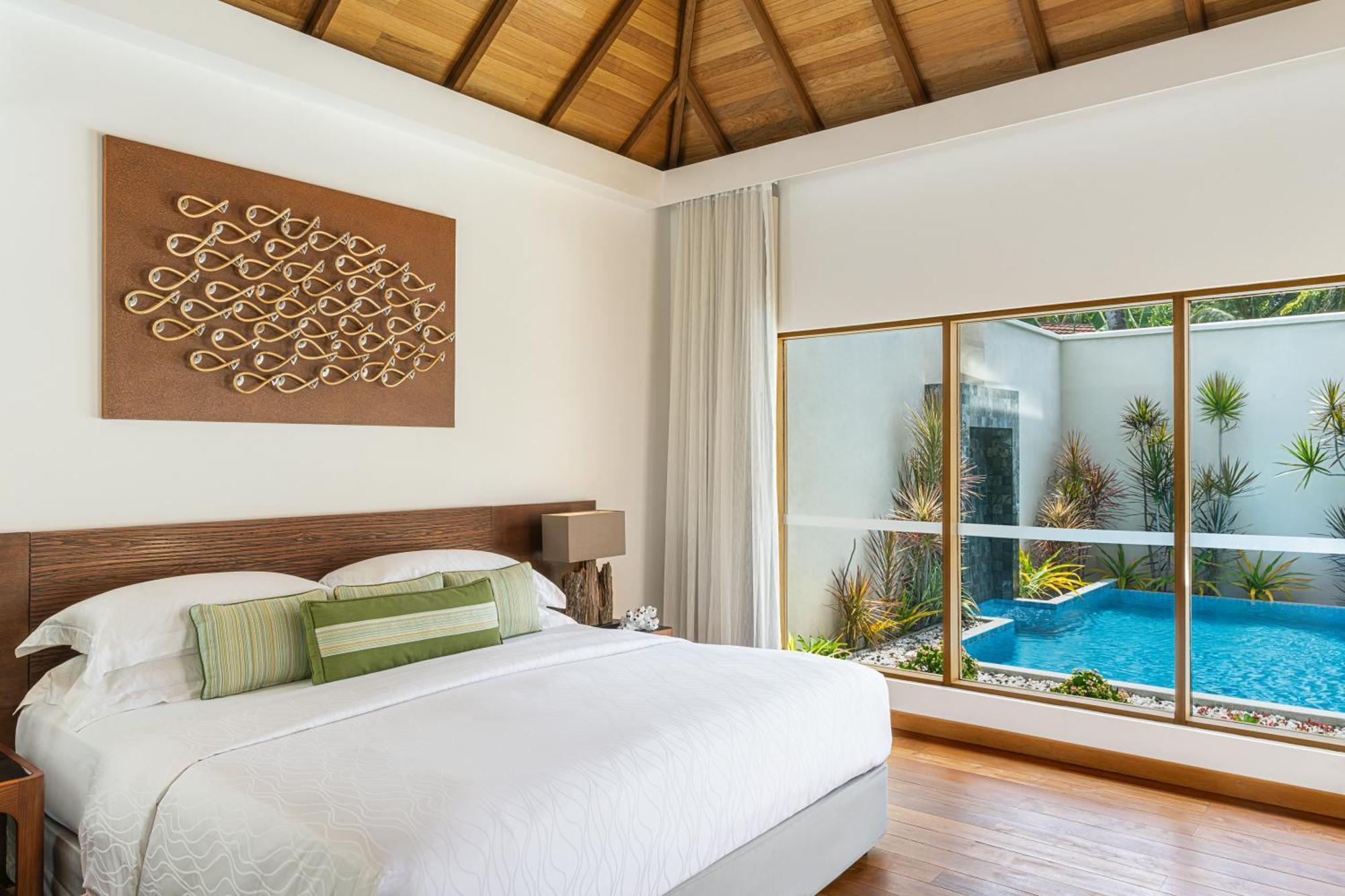 Kurumba Maldives Vihamanaafushi Exterior foto A bedroom at the hotel