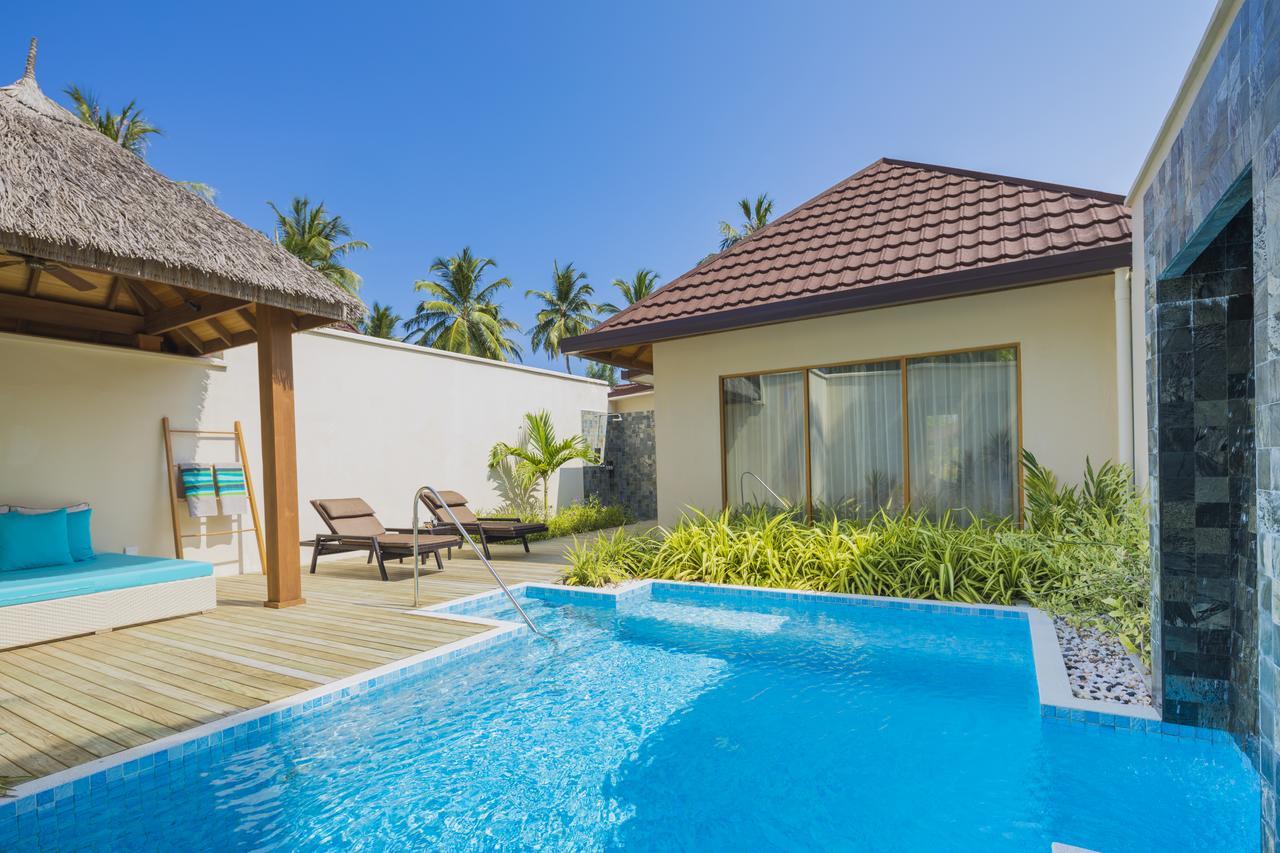 Kurumba Maldives Vihamanaafushi Exterior foto A pool villa at the resort